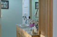The bathroom with doors from the master bedroom and hall. The bathroom with doors from the master bedroom and hall.