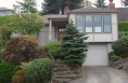 A new welcoming entry addition improves the scale of this home.